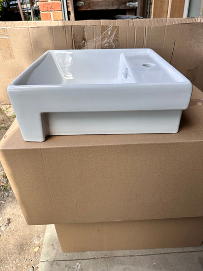 Semi recessed ceramic basin